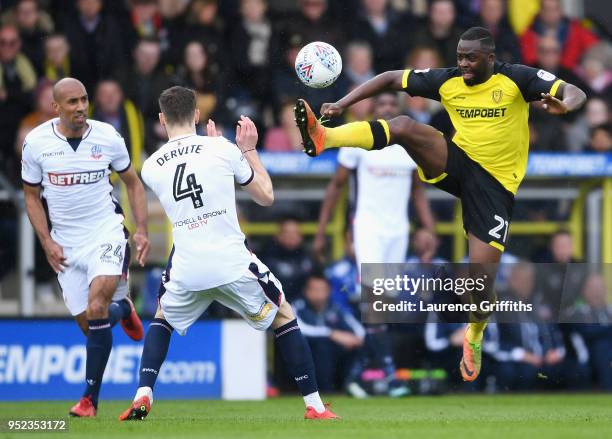 Hope Akpan of Burton Albion controls the ball under pressure from Dorian Dervite of Bolton Wanderers during the Sky Bet Championship match between...