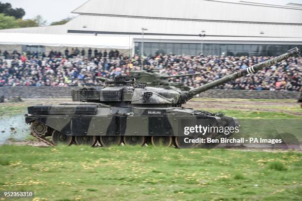 An FV4201 Chieftain main battle tank of the United Kingdom during the 1960s, 1970s and 1980s, drives around the tank course at the Tank Museum in...