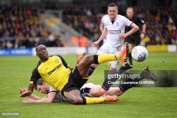 Jon Flanagan of Bolton Wanderers and Lucas Akins of Burton Albion clash during the Sky Bet Championship match between Burton Albion and Bolton...