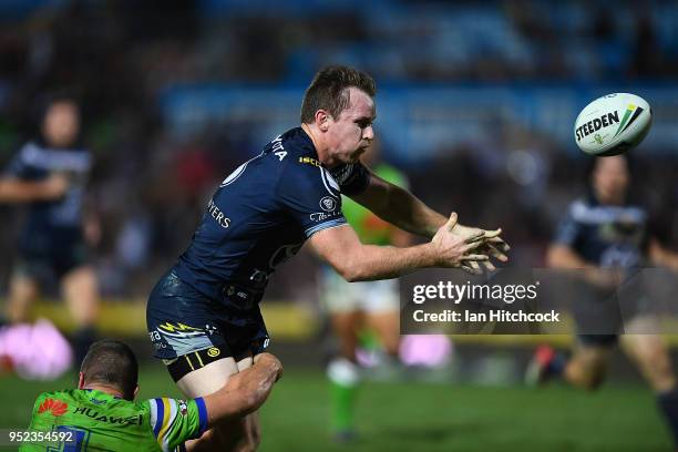 Michael Morgan of the Cowboys drops the ball after being tackled by Jack Wighton of the Raiders during the round eight NRL match between the North...