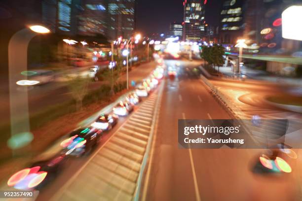 car traffic at night. motion blurred background.shanghai city,china - thruway - fotografias e filmes do acervo