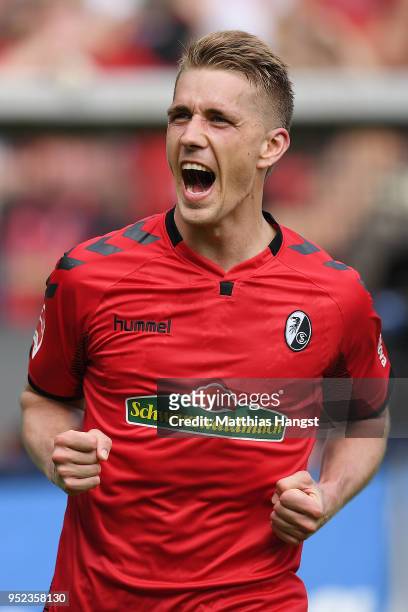 Nils Petersen of Freiburg celebrates after he scored a goal to make it 2:0 during the Bundesliga match between Sport-Club Freiburg and 1. FC Koeln at...