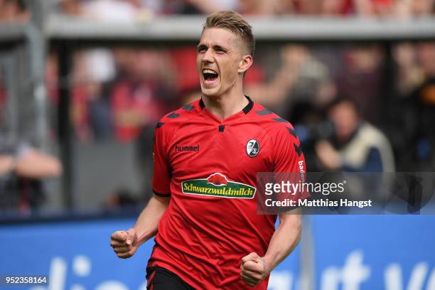 Nils Petersen of Freiburg celebrates after he scored a goal to make it 2:0 during the Bundesliga match between Sport-Club Freiburg and 1. FC Koeln at...