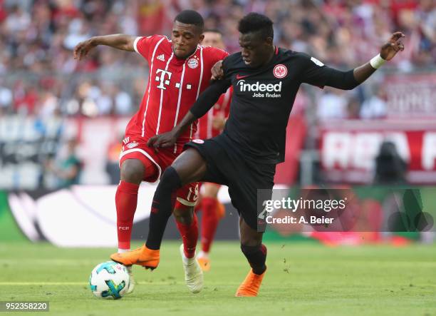 Franck Evina of FC Bayern Munchen fights for the ball with Danny da Costa of Eintracht Frankfurt during the Bundesliga match between FC Bayern...