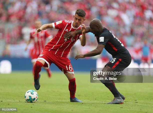 Meritan Shabani of FC Bayern Munchen fights for the ball with Jetro Willems of Eintracht Frankfurt during the Bundesliga match between FC Bayern...