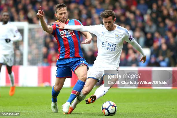 Ben Chilwell of Leicester catches the face of Yohan Cabaye of Crystal Palace as they battle for the ball during the Premier League match between...