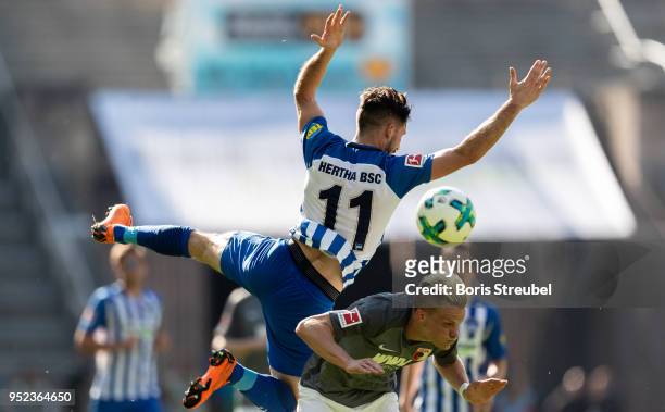 Mathew Leckie of Hertha BSC jumps for a header with Philipp Max of FC Augsburg during the Bundesliga match between Hertha BSC and FC Augsburg at...