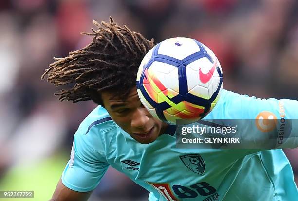 Bournemouth's Dutch defender Nathan Ake heads the ball during the English Premier League football match between Southampton and Bournemouth at St...