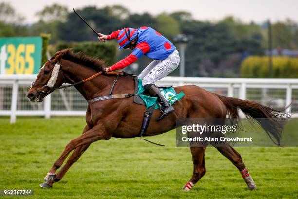 Jamie Moore riding Step Back clear the last to win The bet365 Gold Cup Handicap Steeple Chase at Sandown Park racecourse on April 28, 2018 in Esher,...