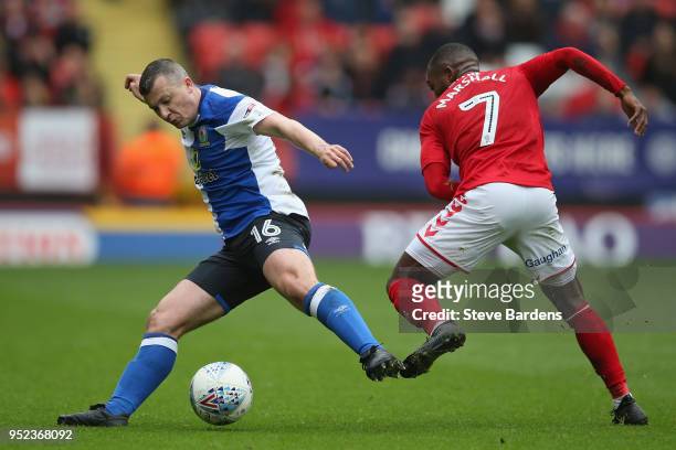 Paul Caddis of Blackburn Rovers breaks away from Mark Marshall of Charlton Athletic during the Sky Bet League One match between Charlton Athletic and...
