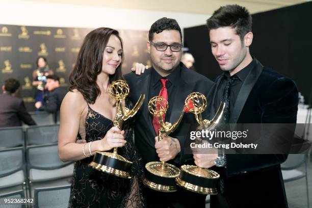 Jade Harlow, Gregori J. Martin and Kristos Andrews display their Emmy's at the 2018 Daytime Creative Arts Emmy Awards at Pasadena Civic Center on...