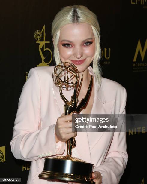 Actress Dove Cameron attends the press room at the 45th Annual Daytime Creative Arts Emmy Awards at the Pasadena Civic Auditorium on April 27, 2018...