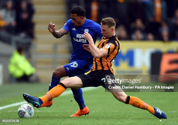 Cardiff City's Nathaniel Mendez-Laing and Hull City's Stephen Kingsley battle for the ball during the Sky Bet Championship match at the KCOM Stadium,...