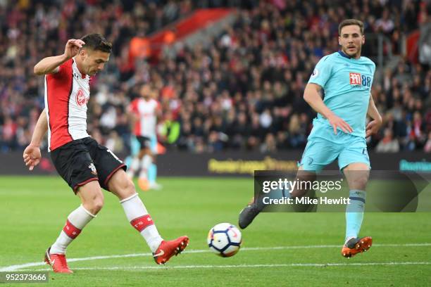 Dusan Tadic of Southampton shoots and scores his side's second goal during the Premier League match between Southampton and AFC Bournemouth at St...