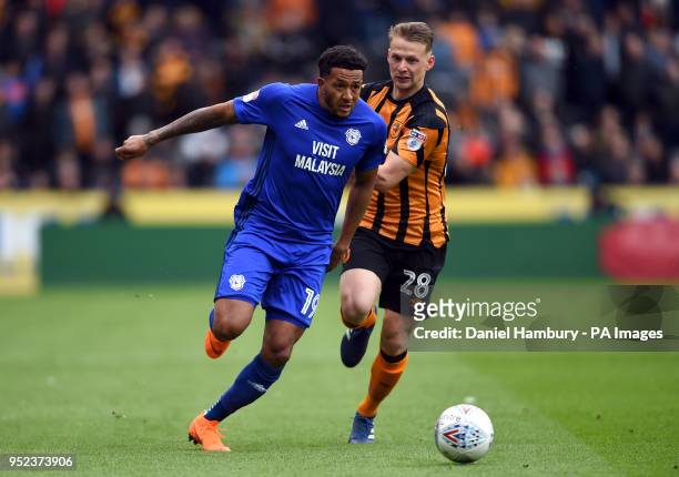 Cardiff City's Nathaniel Mendez-Laing and Hull City's Stephen Kingsley battle for the ball during the Sky Bet Championship match at the KCOM Stadium,...