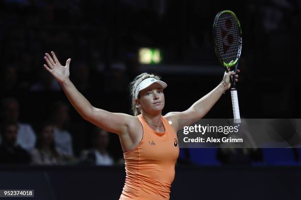 CoCo Vandeweghe of the United States celebrates after winning her match against Caroline Garcia of France during day 6 of the Porsche Tennis Grand...