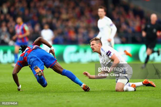 Wilfried Zaha of Crystal Palace and Marc Albrighton of Leicester City clash in the build up to the red card of Marc Albrighton during the Premier...