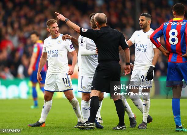 Marc Albrighton of Leicester City reacts after he is shown a red cardduring the Premier League match between Crystal Palace and Leicester City at...