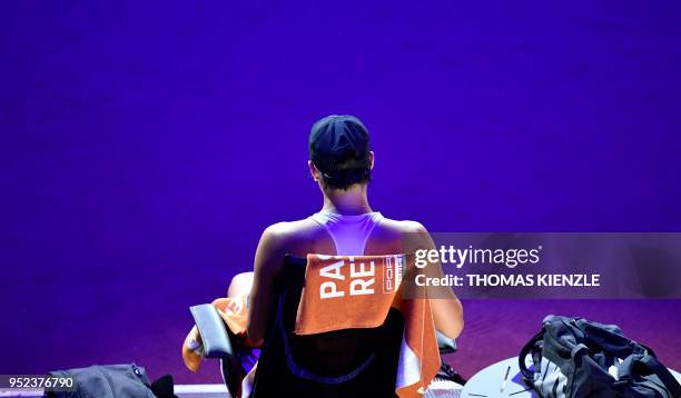 France's Caroline Garcia sits on her chair during a break as plays against US CoCo Vandeweghe their semi-final match at the WTA Tennis Grand Prix in...