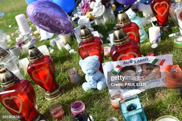 Tributes for terminally-ill British toddler Alfie Evans who died on Saturday are left outside the Alder Hey Children's hospital in Liverpool, north...