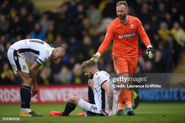 Darren Pratley and Ben Alnwick check if team mate Mark Beevers of Bolton Wanderers is ok during the Sky Bet Championship match between Burton Albion...