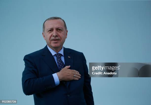 Turkish President Recep Tayyip Erdogan greets the crowd after attending AK Party's 6th ordinary provincial congress in western Izmir province, Turkey...