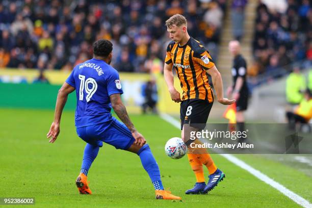 Stephen Kingsley of Hull City in action against Nathaniel Mendez-Laing of Cardiff City during the Sky Bet Championship match between Hull City and...