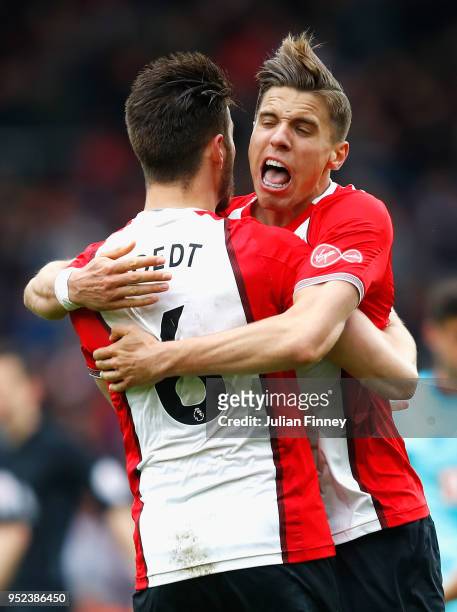 Jan Bednarek of Southampton celebrates his sides victory with teammate Wesley Hoedt after the Premier League match between Southampton and AFC...