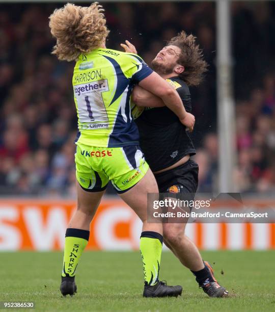 Exeter Chiefs' Alec Hepburn is tackled by Sale Sharks' Ross Harrison during the Aviva Premiership match between Exeter Chiefs and Sale Sharks at...