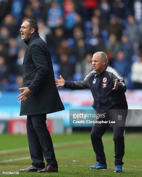 Manager Paul Clement of Reading and his Assistant Nigel Gibbs after a shot goes wide during the Sky Bet Championship match between Reading and...