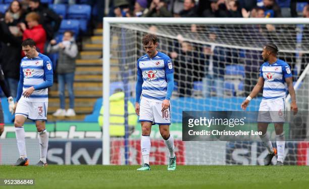 John Swift of Reading looks dejected with his team mates after they go 0-1 down during the Sky Bet Championship match between Reading and Ipswich...