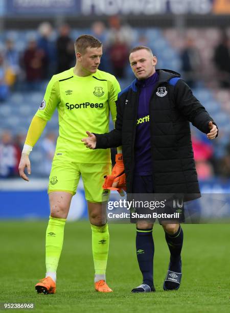 Jordan Pickford of Everton talks with Wayne Rooney of Everton after the Premier League match between Huddersfield Town and Everton at John Smith's...