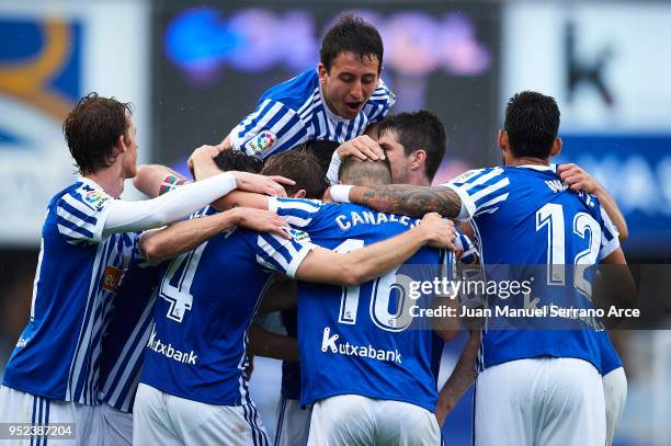 Players of Real Sociedad celebrates a own goal of Mikel San Jose of Athletic Club during the La Liga match between Real Sociedad and Athletic Club at...