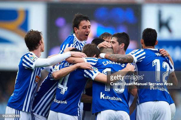 Players of Real Sociedad celebrates a own goal of Mikel San Jose of Athletic Club during the La Liga match between Real Sociedad and Athletic Club at...