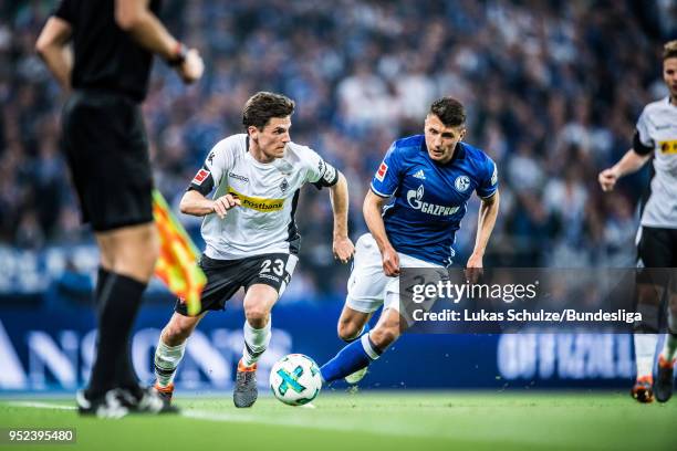 Jonas Hofmann of Moenchengladbach and Alessandro Schoepf of Schalke in action during the Bundesliga match between FC Schalke 04 and Borussia...