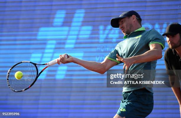 Australian John Millman returns the ball to Slovenian Aljaz Bedene during their ATP semifinal tennis match at the Hungarian Open in Budapest, on...