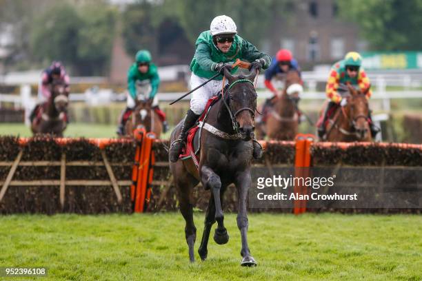 Nico de Boinville riding Call Me Lord clear the last to win The bet365 Select Hurdle Race at Sandown Park racecourse on April 28, 2018 in Esher,...