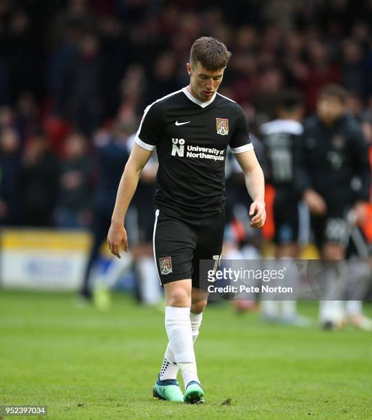 Chris Long of Northampton Town looks dejected as he walks from the pitch at the end of the game after defeat almost relegate his team during the Sky...