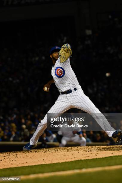 Carl Edwards Jr. #6 of the Chicago Cubs pitches against the Milwaukee Brewers during the eighth inning on April 26, 2018 at Wrigley Field in Chicago,...