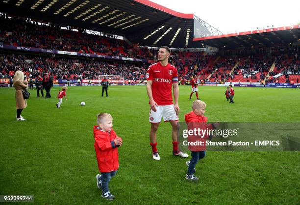 Charlton Athletic's Jason Pearce with his children at full time Charlton Athletic v Blackburn Rovers - Sky Bet League One - The Valley .