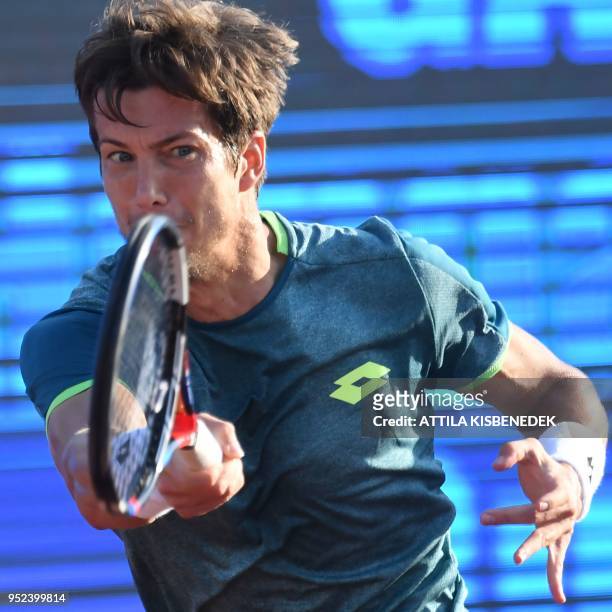 Slovenian Aljaz Bedene returns the ball to Australian John Millman during their ATP semifinal tennis match at the Hungarian Open in Budapest, on...