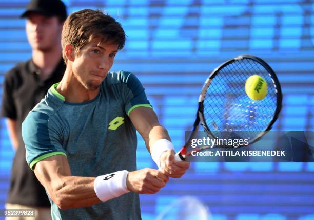 Slovenian Aljaz Bedene returns the ball to Australian John Millman during their ATP semifinal tennis match at the Hungarian Open in Budapest, on...