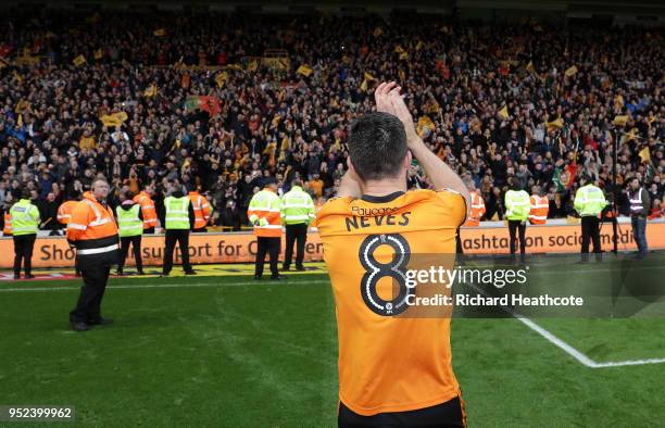 Ruben Neves of Wolverhampton Wanderers shows appreciation to the fans following the Sky Bet Championship match between Wolverhampton Wanderers and...