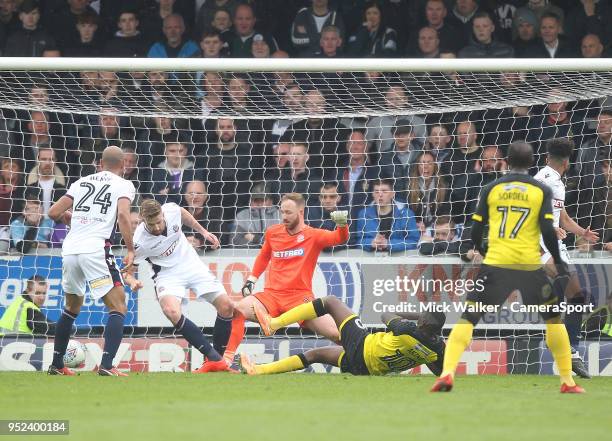 Burton Albion's Lucas Atkins scores his sides second goal beating Bolton Wanderers Ben Alnwick during the Sky Bet Championship match between Burton...