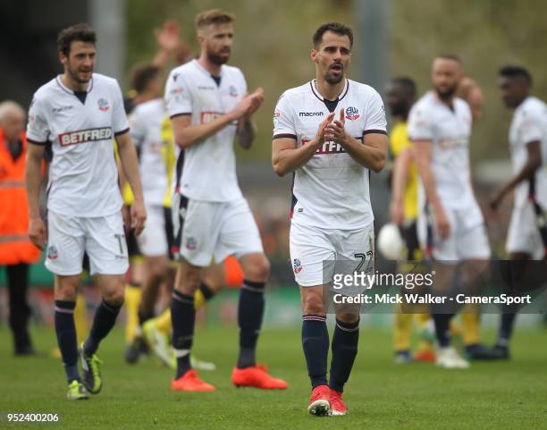 Bolton Wanderers players look dejected during the Sky Bet Championship match between Burton Albion and Bolton Wanderers at Pirelli Stadium on April...