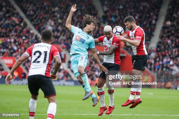 Shane Long and Mario Lemina of Southampton clear from Nathan Ake of Bournemouth during the Premier League match between Southampton and AFC...