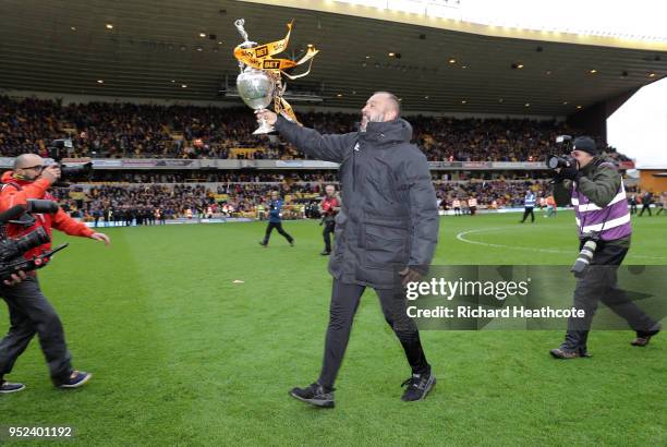 Nuno Espirito Santo, Manager of Wolverhampton Wanderers celebrates with the Sky Bet Championship trophy following the Sky Bet Championship match...