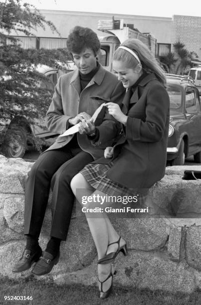 Serbian actress Beba Loncar and American actor George Chakiris during the filming of 'Sharon vestida de rojo' Madrid, Spain.