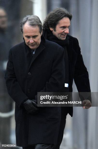 Dominique Paille and Frederic Lefebvre arrive for the funeral of French politician, Philippe Seguin, at the Saint-Louis-des-Invalides Church in Paris.