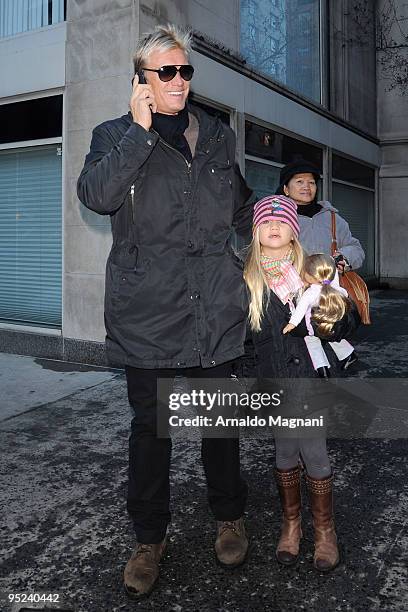 Actor Dolph Lundgren and his daughter Greta Eveline Lundgren walk on Madison Avenue December 24, 2009 in New York City.